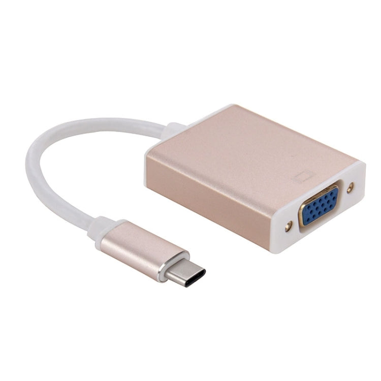 Rose gold USB-C to VGA adapter with USB-C connector and VGA output port.
