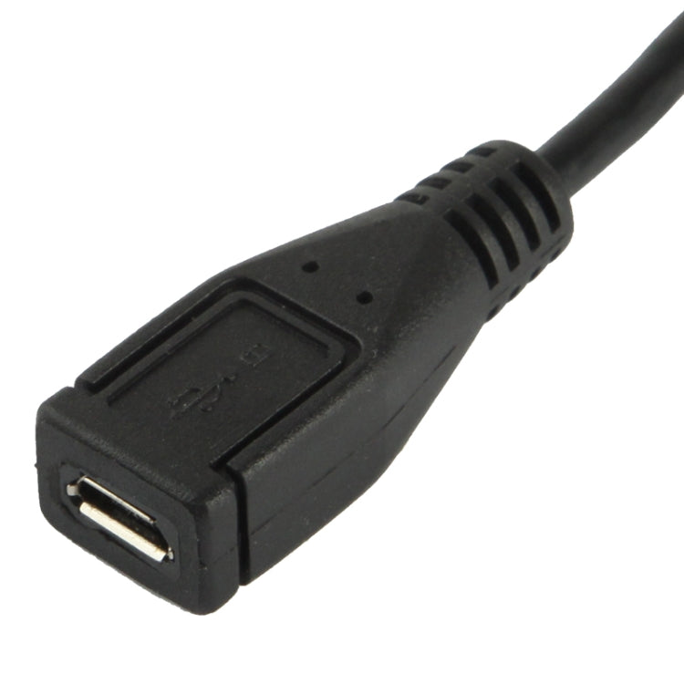 Micro USB female port with black housing on right-angle adapter cable