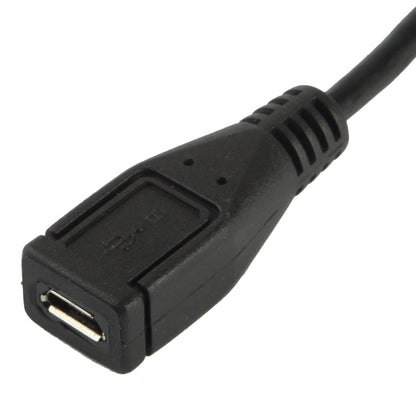 Micro USB female port with black housing on right-angle adapter cable