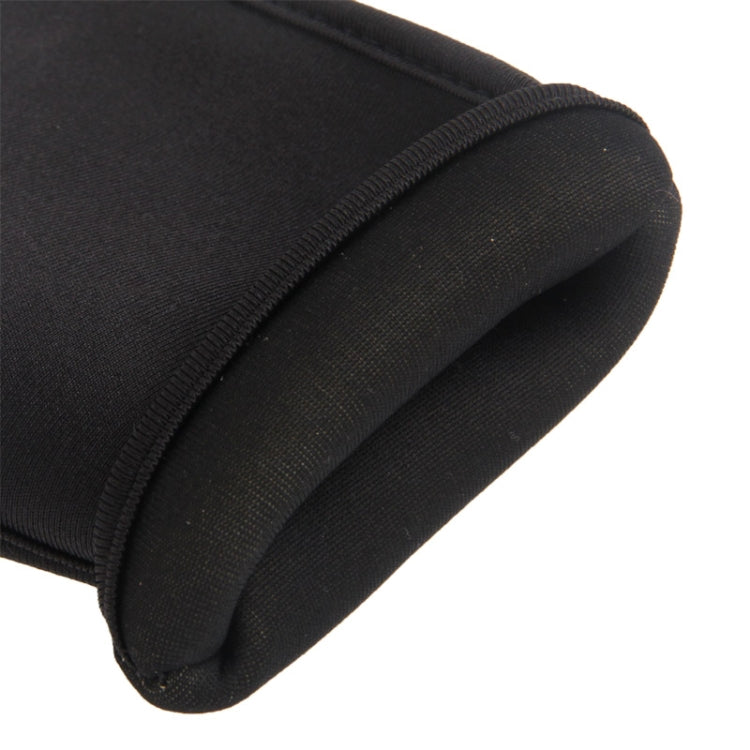 Close-up of dark waterproof phone case edge stitching and reinforced fabric corner