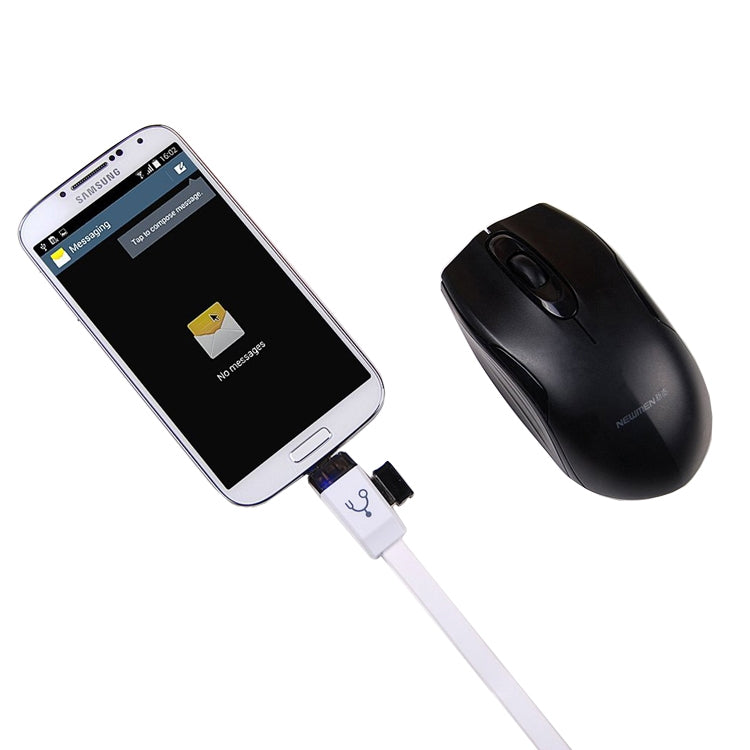 White OTG cable with micro USB connector plugged into smartphone and mouse