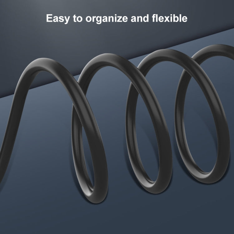 Flexible black coiled USB to USB-C cable for easy storage and routing