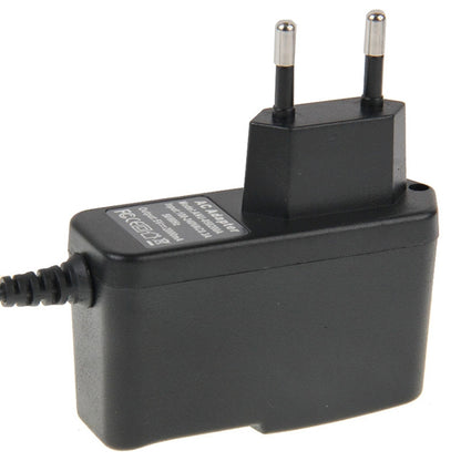 Black AC wall charger with dual metal prongs and DC barrel output