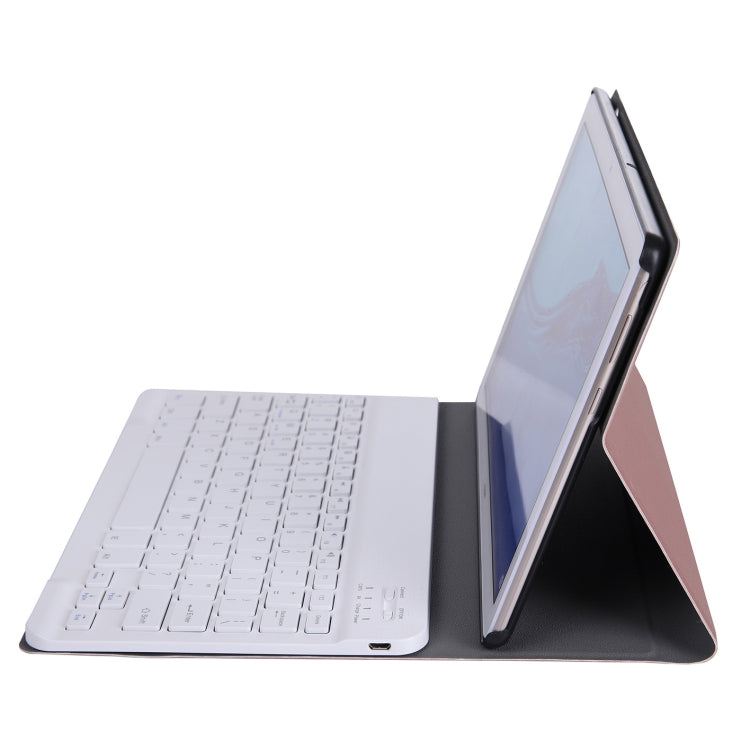 Light keyboard folio case with angled stand holding a tablet