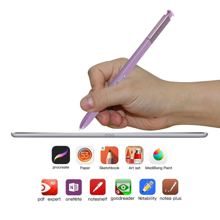 Purple stylus pen held in hand above phone screen