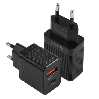 Black EU wall travel charger with ribbed case and USB ports, two prong plug