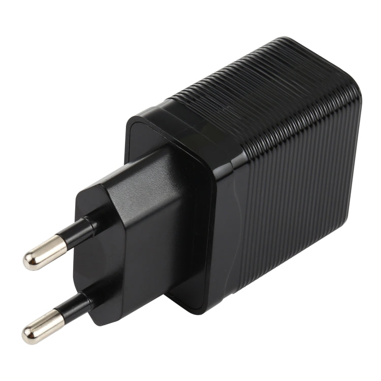 Black EU plug travel charger with ribbed body and two metal prongs