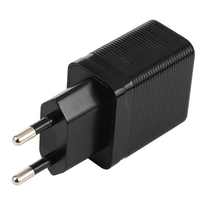 Black EU plug travel charger with ribbed body and two metal prongs