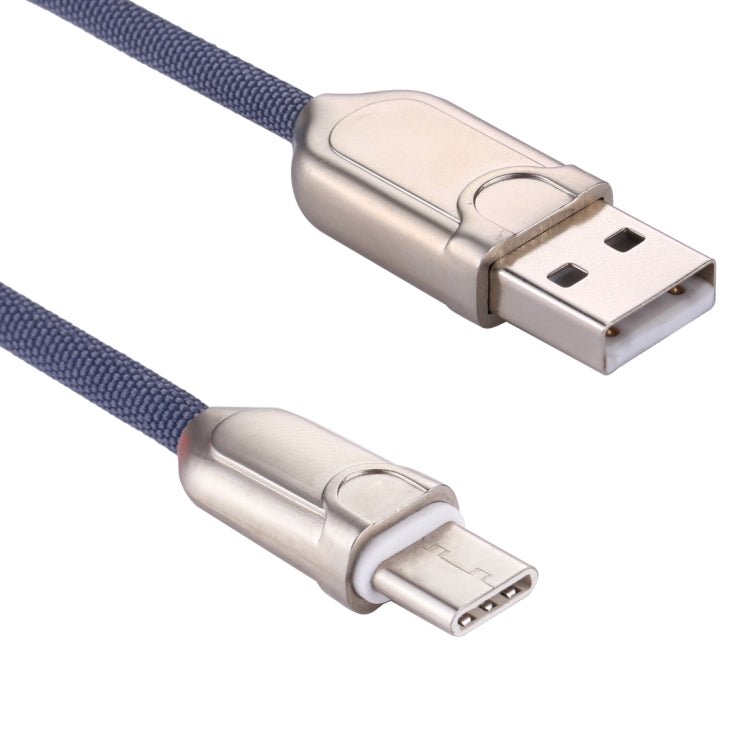 Blue braided USB-A to USB-C cable with metal USB-A and USB-C ends close-up