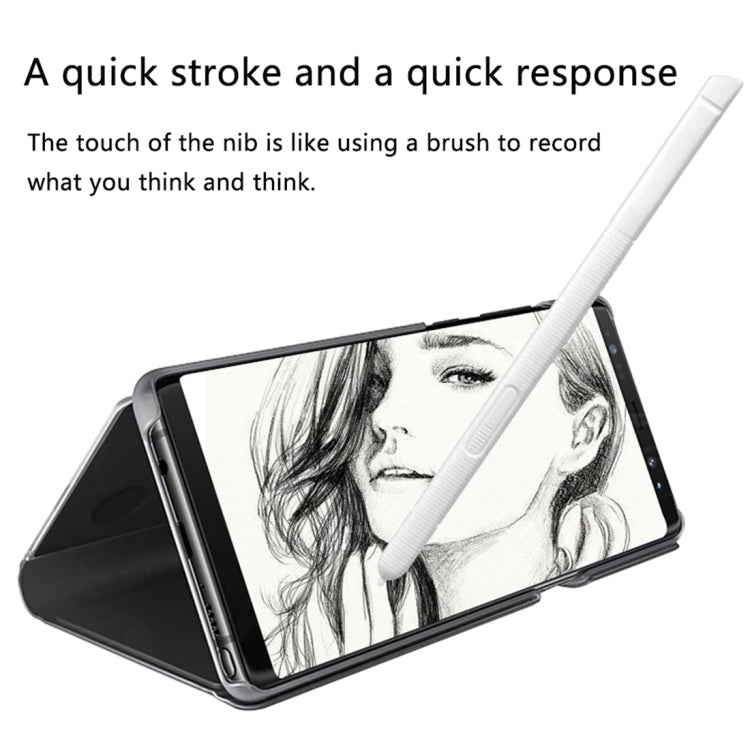 White touch stylus pen held above tablet screen with grayscale drawing