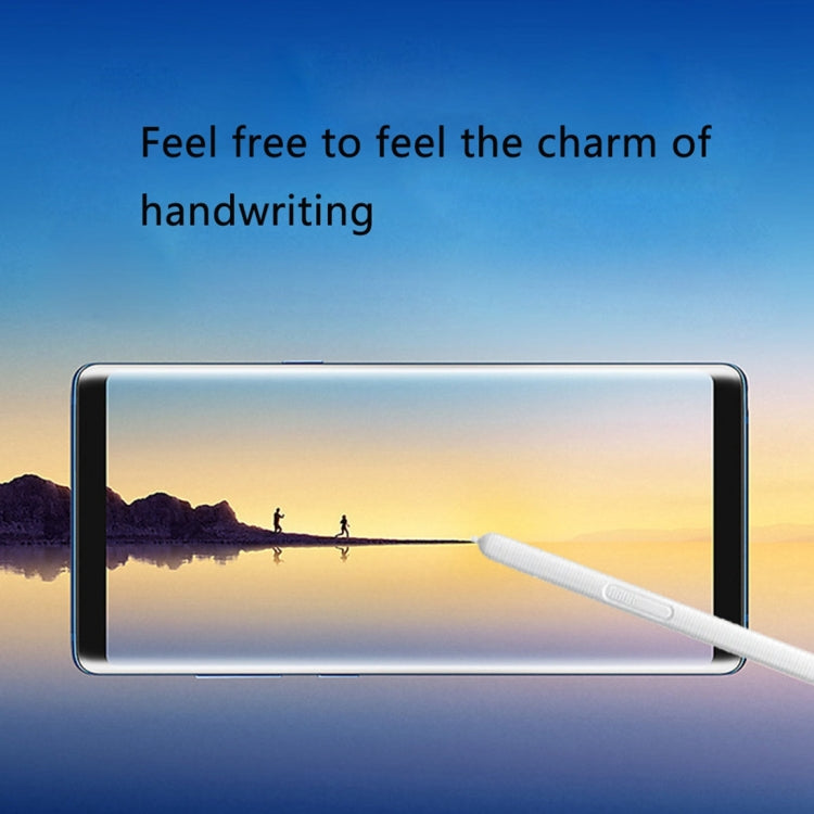 White touch stylus pen over tablet display, angled for writing
