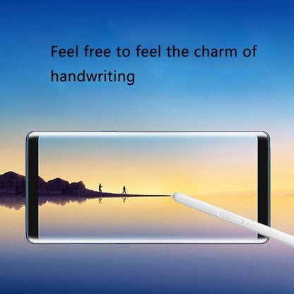 White touch stylus pen over tablet display, angled for writing