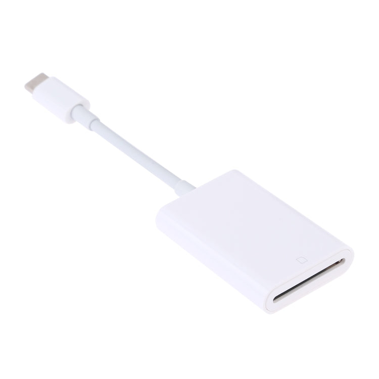 USB-C to SD card reader adapter, white cable with exposed SD connector port