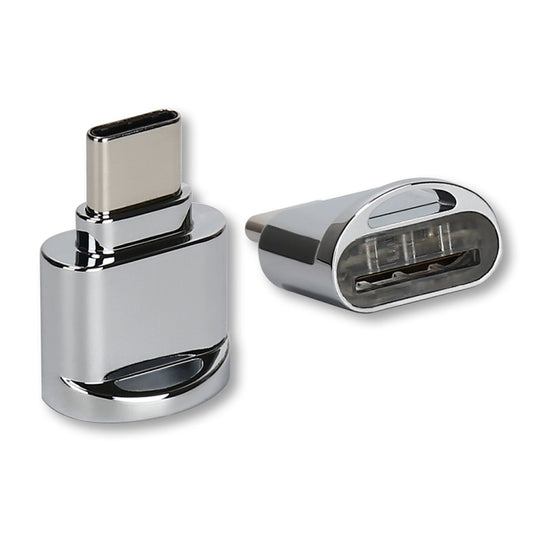 Silver USB-C to TF card reader adapter with exposed card slot and metal body