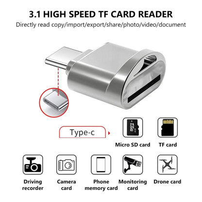 Silver USB-C TF card reader adapter with visible Type-C end and card slot