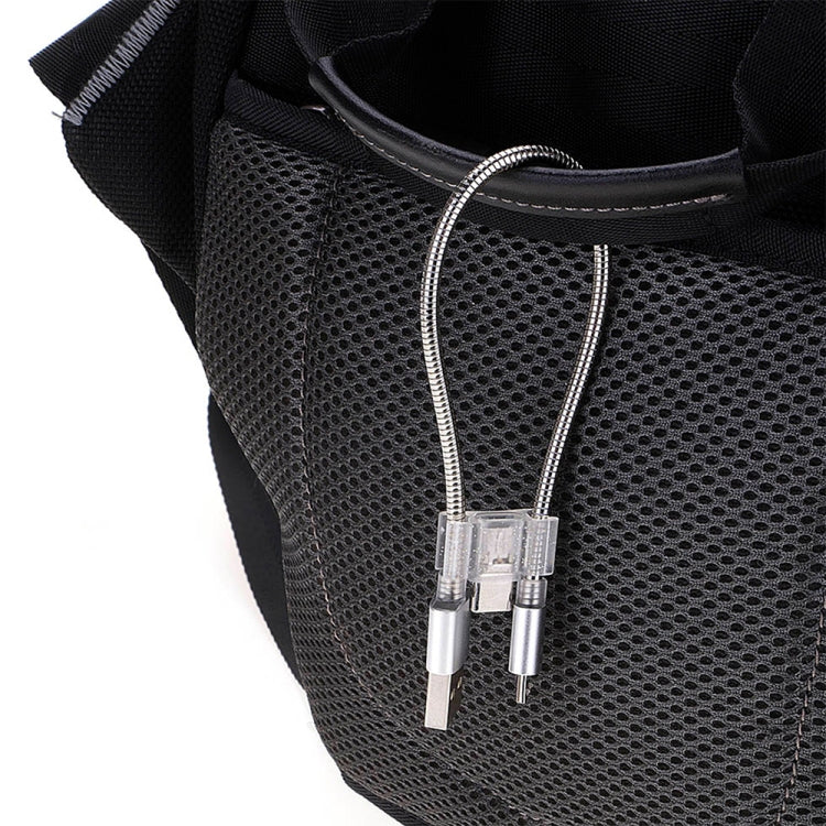 USB charging cable connectors on a black mesh pouch, braided and flexible