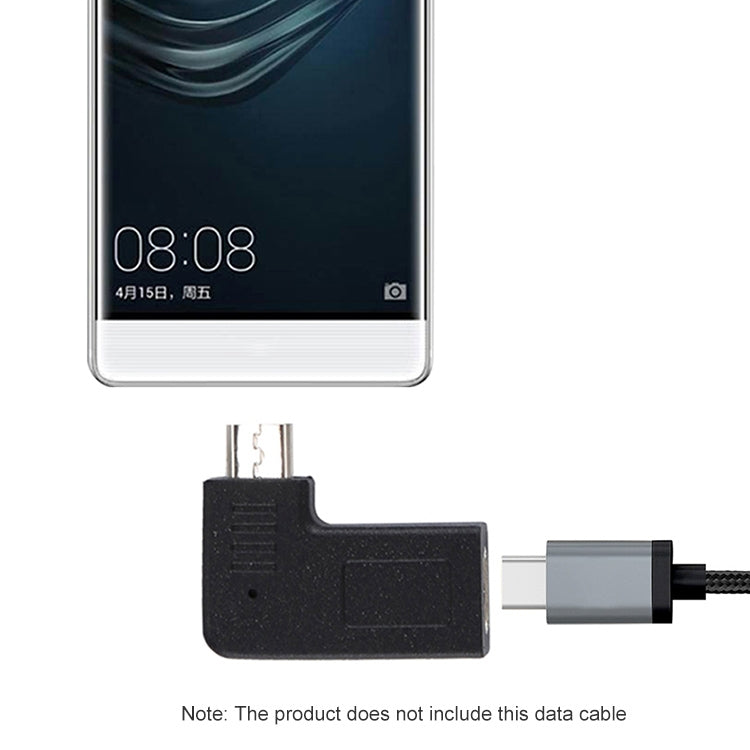 Angled black USB adapter connected to a phone charging port