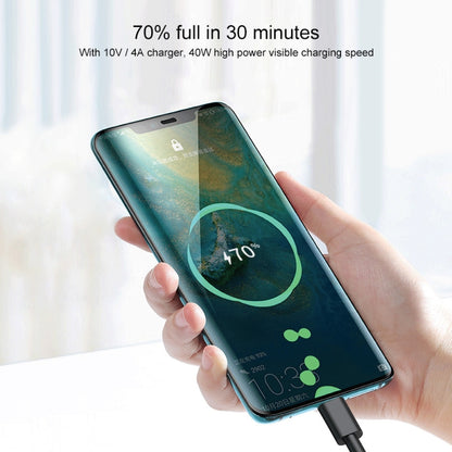 USB to Micro USB charging cable connected to a smartphone in hand