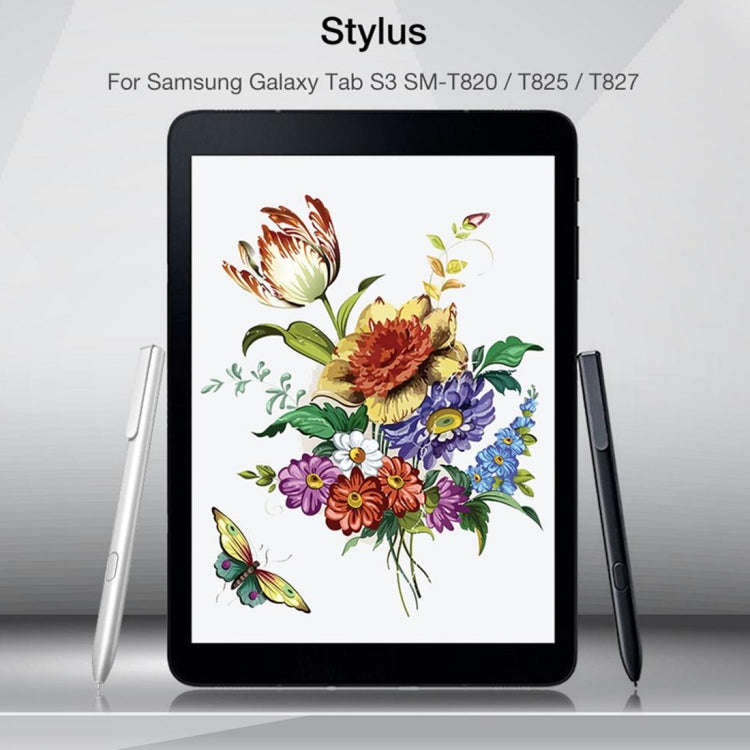 Touch screen stylus pens in black and light gray, shown beside tablet