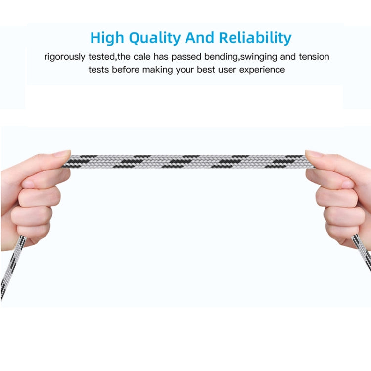 Nylon braided USB OTG adapter cable held by hands, grey housing ends