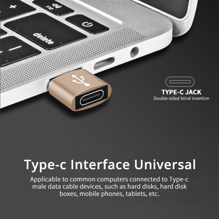 Gold USB-C to USB 2.0 adapter, compact aluminum housing with Type-C plug