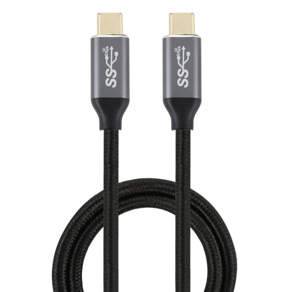 Black braided USB-C male to USB-C male cable with gold connector tips, 1m length.