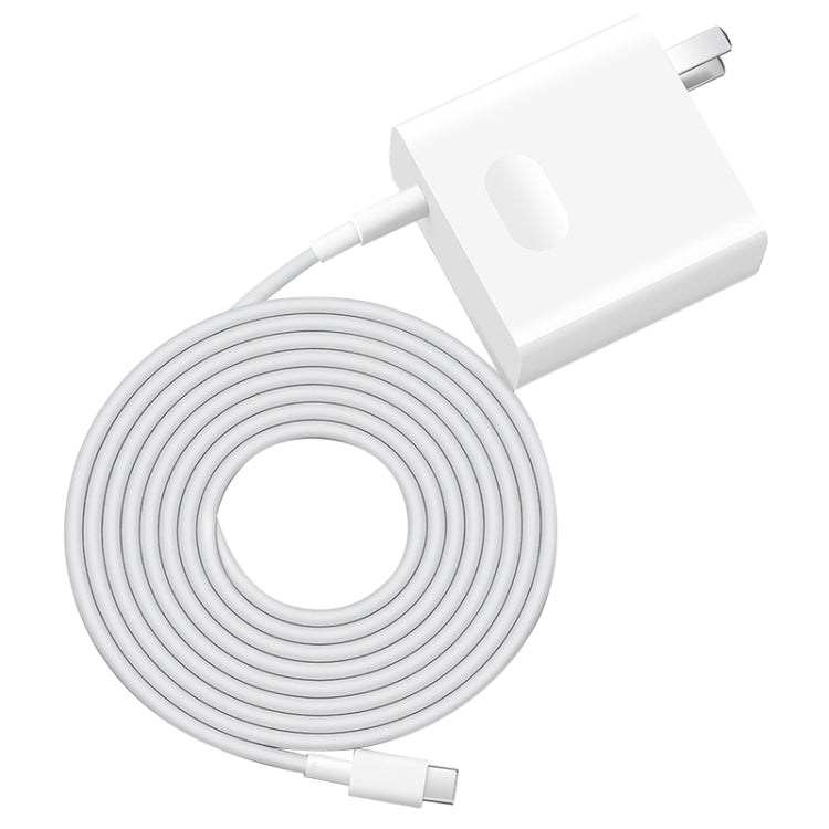White Huawei MateBook laptop power adapter with coiled cable and US plug
