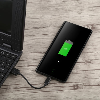Black USB to USB-C charging cable connected to a smartphone