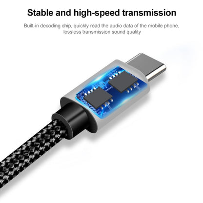 Black braided audio cable with Type-C male plug and internal connector detail