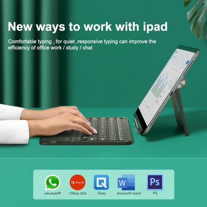 Bluetooth keyboard with touchpad in use with tablet, typing with a hand
