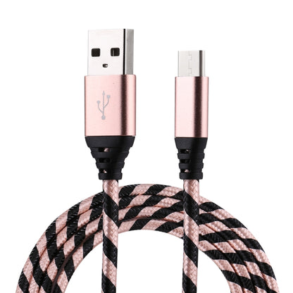 Rose gold USB-A to USB-C cable with pink braided weave and black connector tips