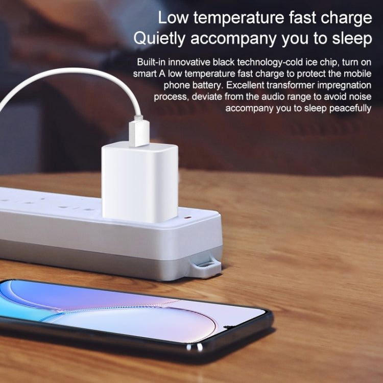 White EU plug USB travel charger with single USB port, cable connected to phone