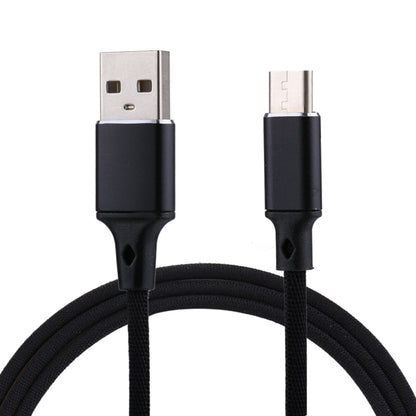 Black USB-A to USB-C charging and data cable with braided nylon jacket and metal ends