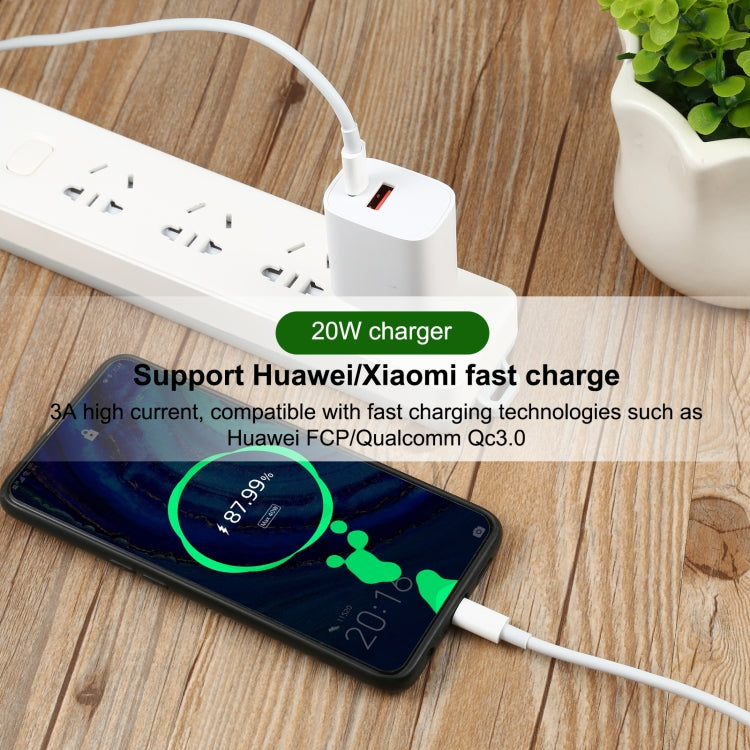 White USB-C to USB-C fast charging cable plugged into a phone and charger
