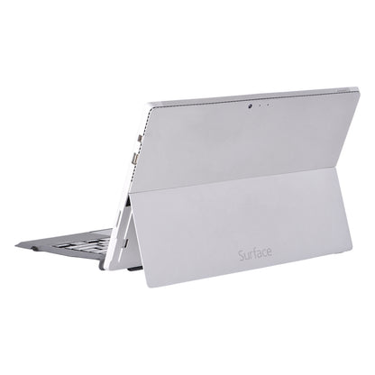 White tablet keyboard case with stand, showing Surface back and hinge