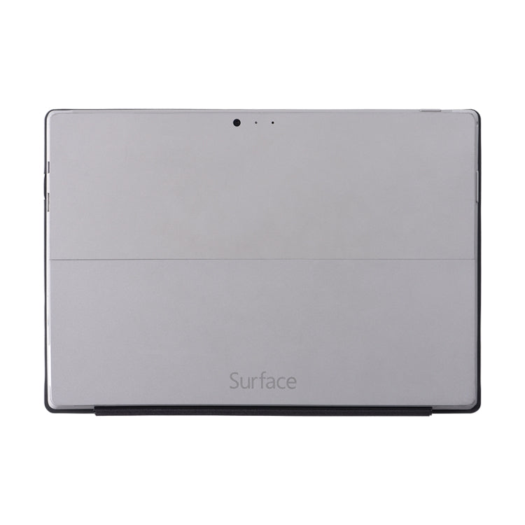Gray flip tablet case back with camera hole opening and smooth leather texture