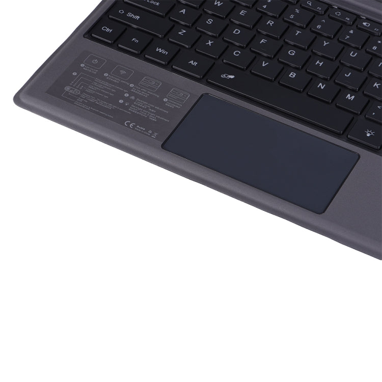 Dark gray Bluetooth keyboard holster with trackpad and function-key controls