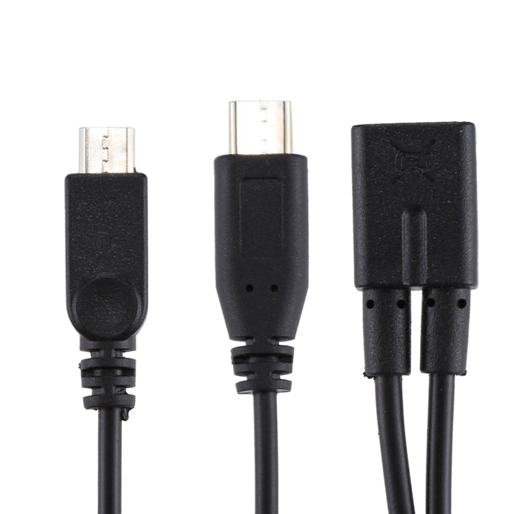Black multi-tip charging cable showing micro-USB and USB-C style connectors