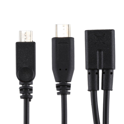 Black multi-tip charging cable showing micro-USB and USB-C style connectors