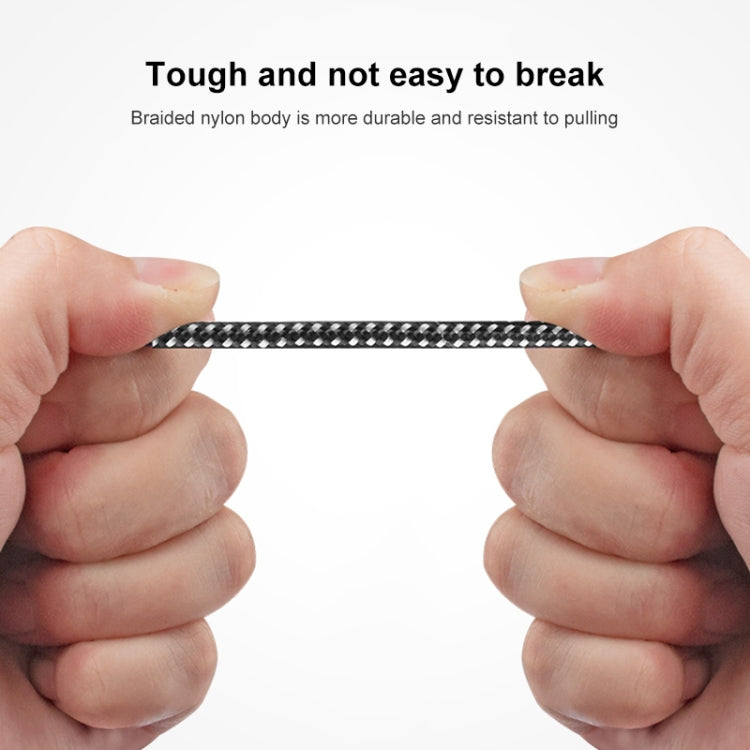 Braided nylon USB-C 2-in-1 adapter cable held by hands near the 3.5mm port.