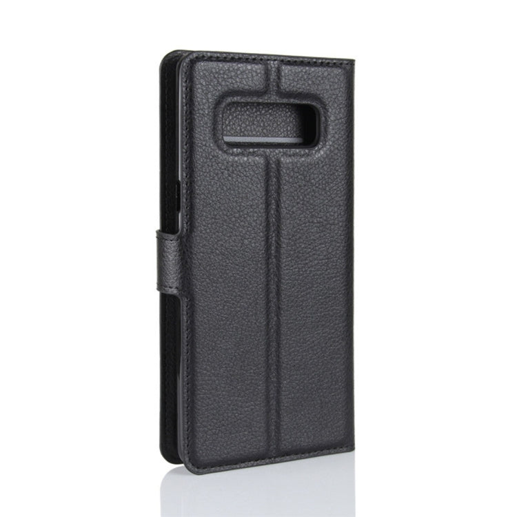 Black leather flip phone case with vertical side opening and cutout