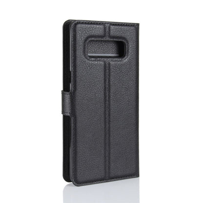 Black leather flip phone case with vertical side opening and cutout