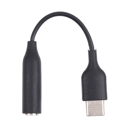 Black USB-C to 3.5mm audio adapter cable with two connector ends