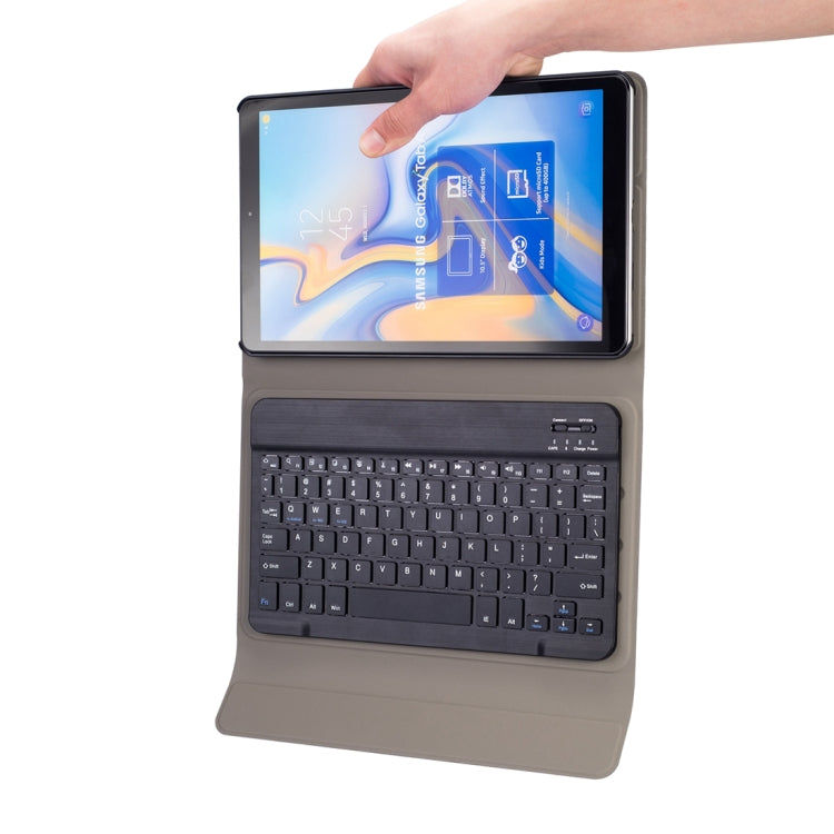Gray tablet keyboard case with detachable keyboard and hand holding tablet
