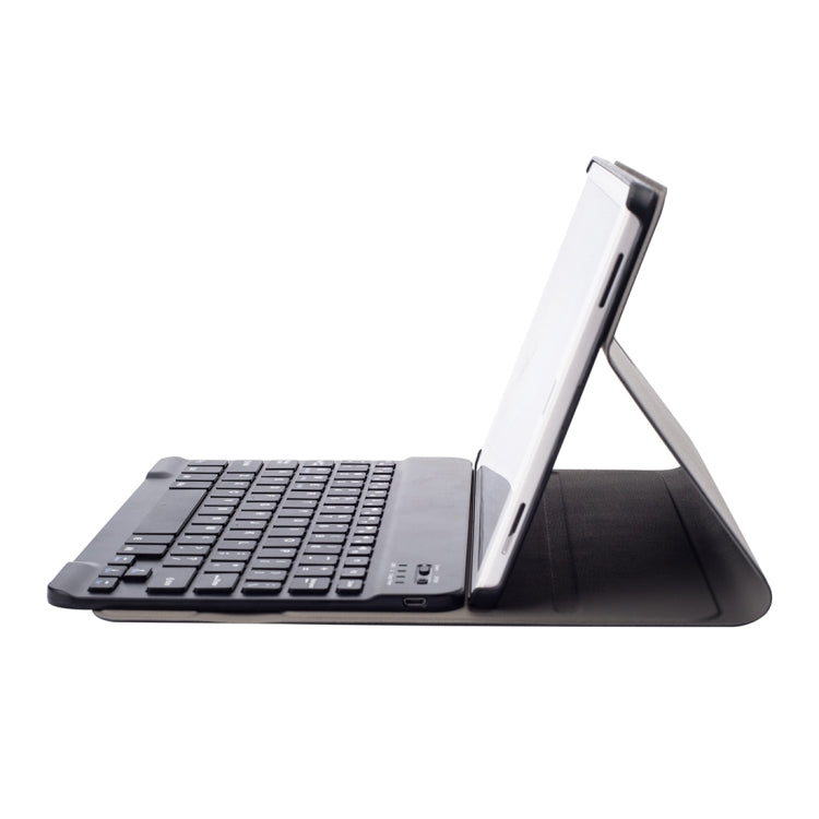 Black folio tablet keyboard case showing adjustable stand and side buttons