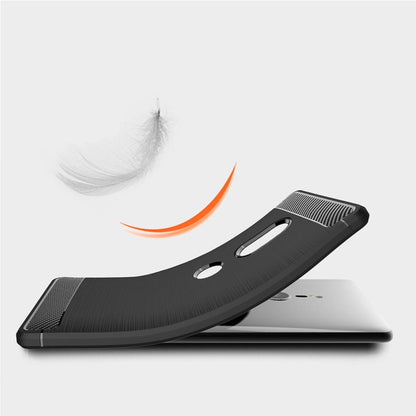 Black shockproof TPU phone case with raised edges around camera and screen