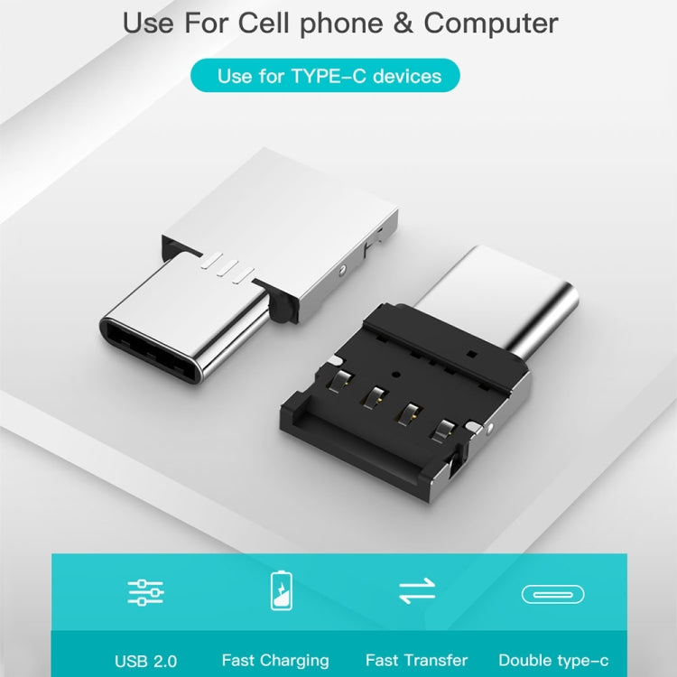 USB-C male to USB female OTG adapter with silver aluminum housing and black socket