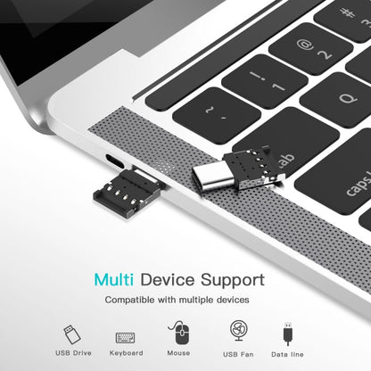 Aluminum USB-C OTG adapter connector, black internal contacts visible on port