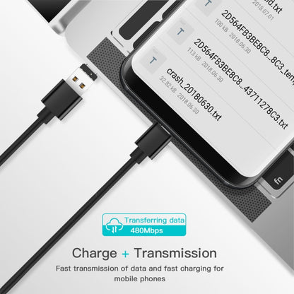 USB-C OTG adapter connected to a phone, with USB female end visible