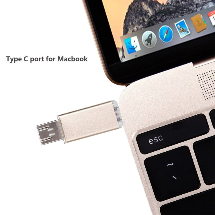 Gold 16GB USB Type-C flash drive inserted into a laptop port